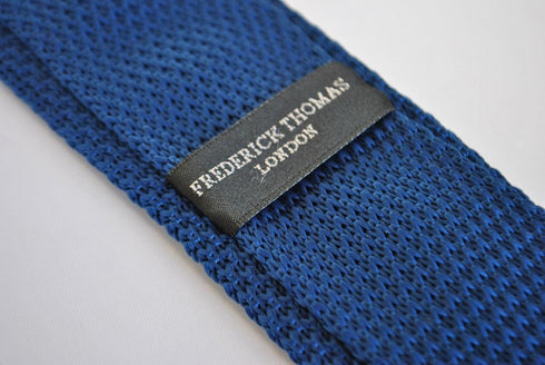 navy blue skinny knitted tie with brown polka dots
